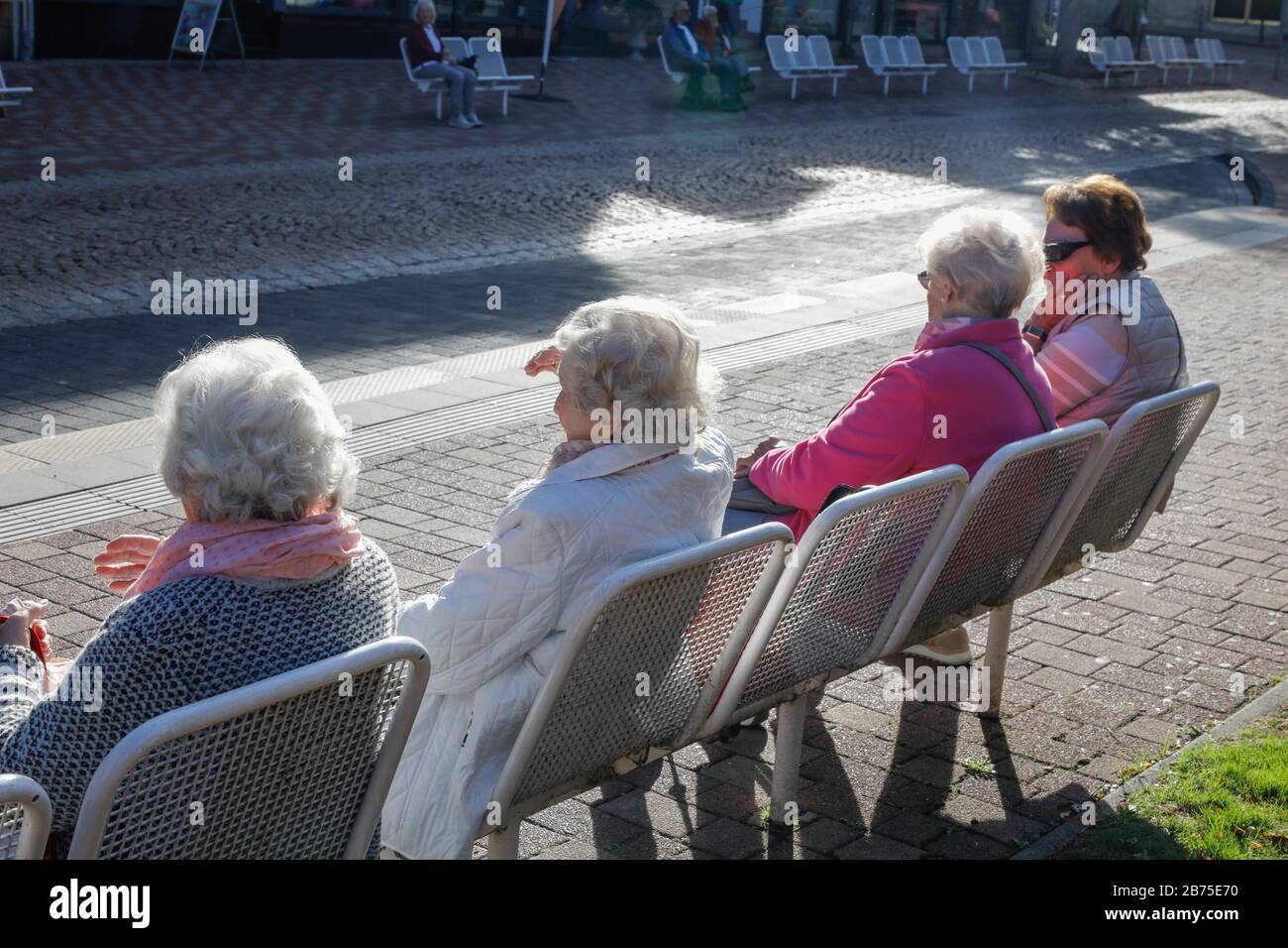 Women pensioners sit on a bench on 06.10.2018. [automated translation] Stock Photo