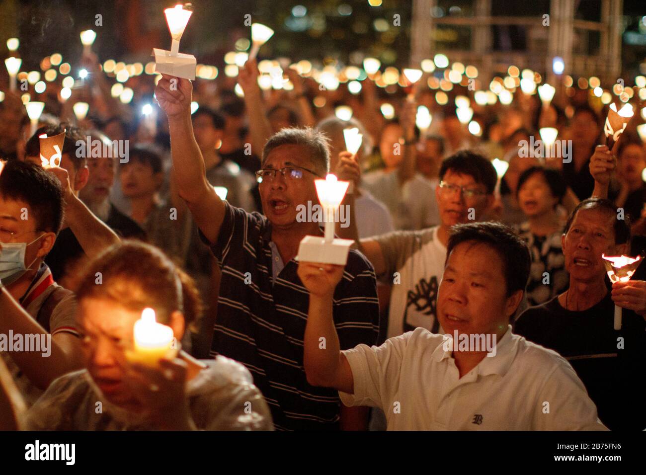 Thousands of people gather in Victoria Park to commemorate the 4 June 1989 massacre in Hong Kong, China, 04 June 2018. They also demand the end of the one-party rule in China and paid tribute to the deceased Chinese dissident and Nobel laureate Liu Xiaobo. Hong Kong is the only place on Chinese territory where such a vigil is allowed. Stock Photo