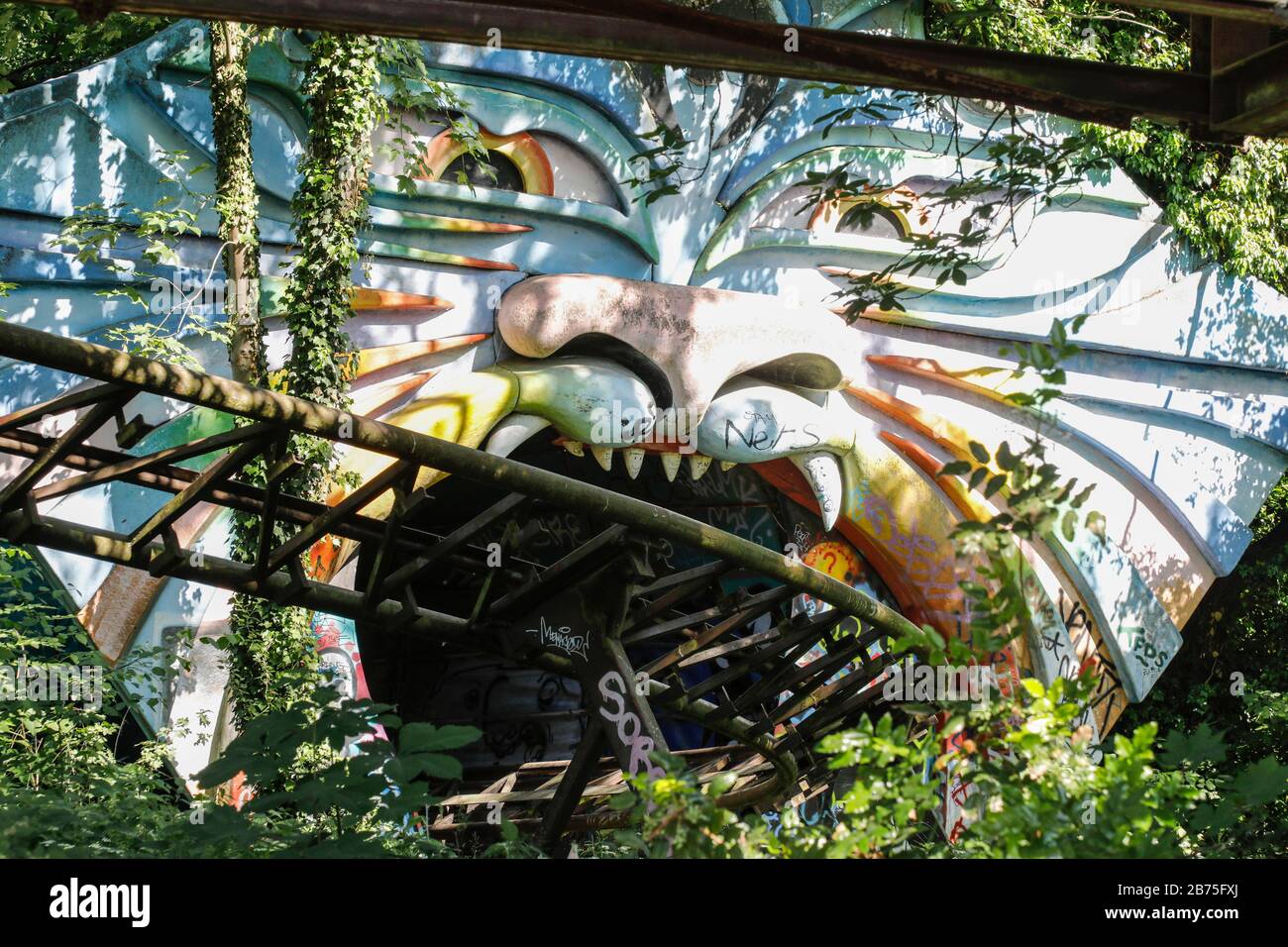 View of the rusting roller coaster in the former Spreepark in the Berlin Plaenterwald, in the foreground are dummies of houses. In GDR times the playground was a well visited amusement park. Gruen Berlin GmbH will redesign the park. [automated translation] Stock Photo