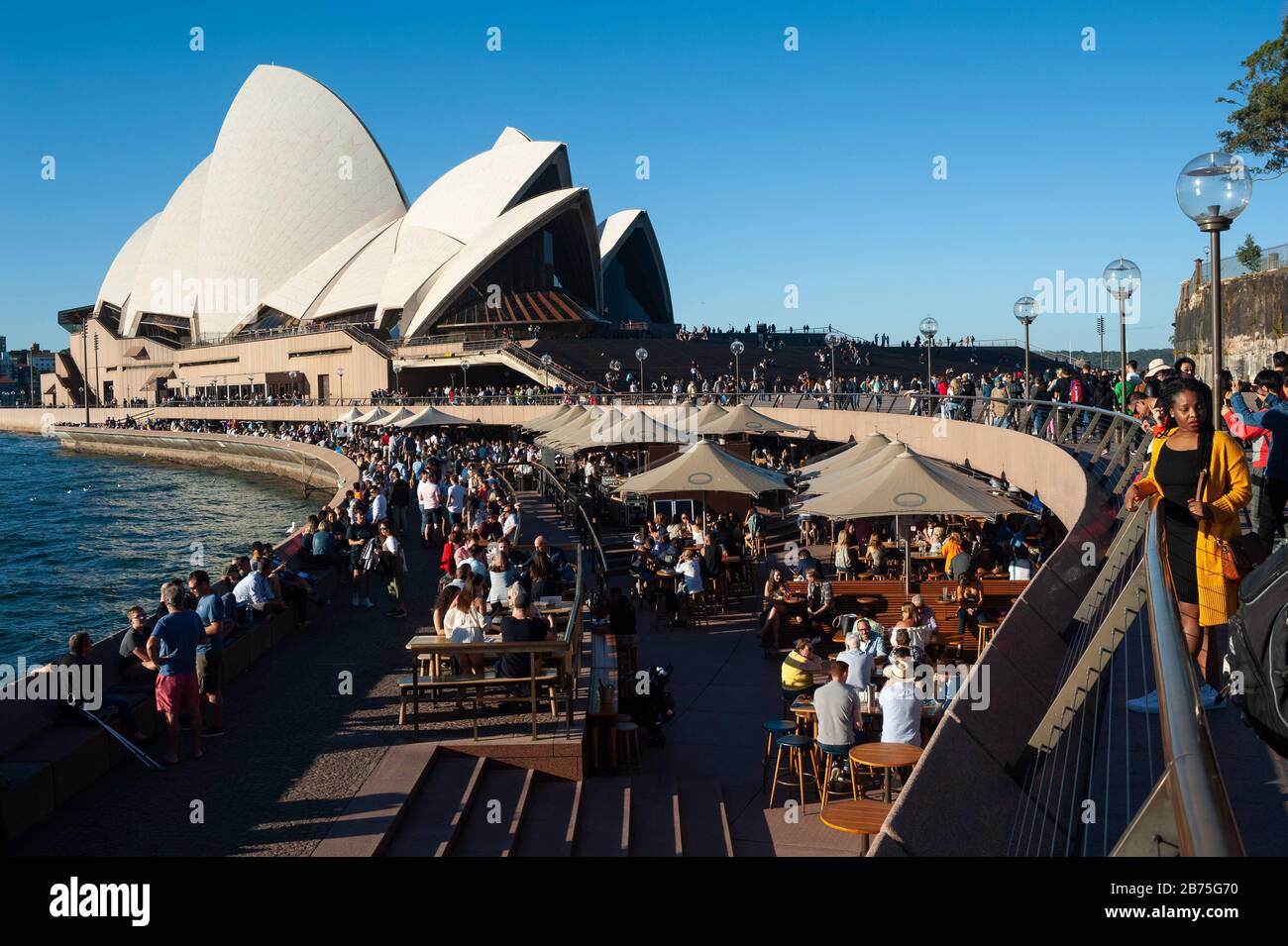 06.05.2018, Sydney, New South Wales, Australia - A view of the Sydney Opera House at Bennelong Point with the Opera Bar in the foreground. [automated translation] Stock Photo