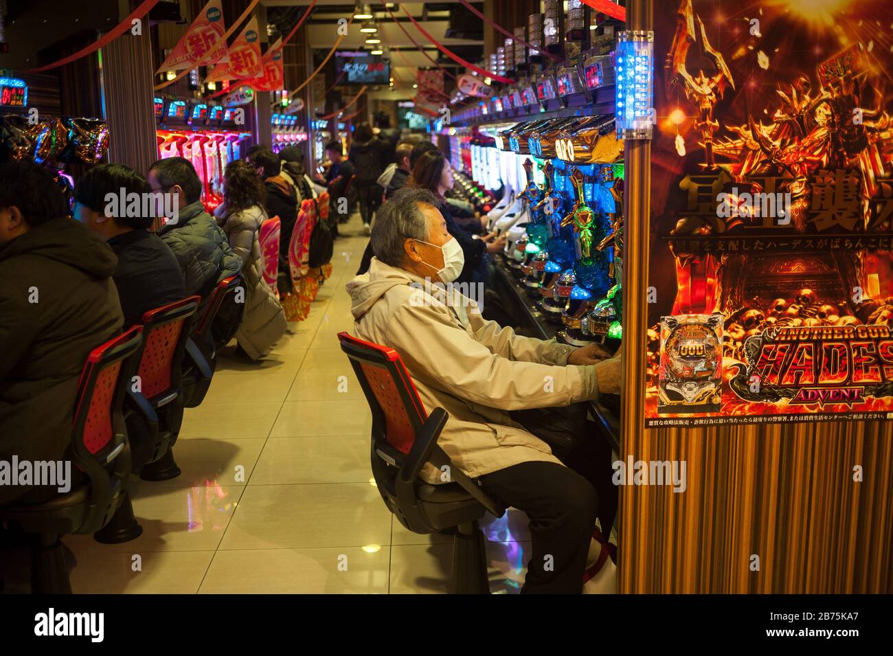 23 12 17 Kyoto Japan Asia Japanese People Sit In Front Of Slot Machines In A Gambling Hall In Kyoto And Pass The Time With Pachinko Japan Generates More Than 4 Of Its