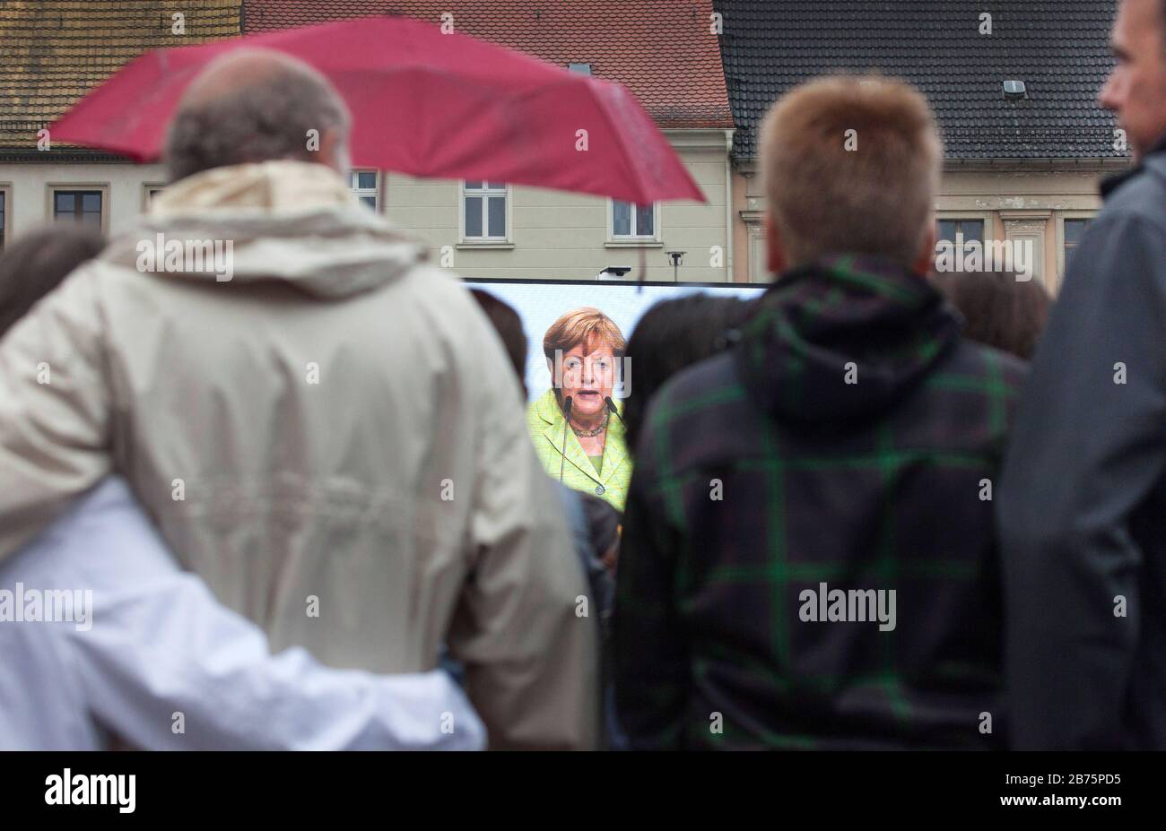 Chancellor Angela Merkel can be seen on a video screen during a CDU election campaign event in Torgau on September 6, 2017. [automated translation] Stock Photo