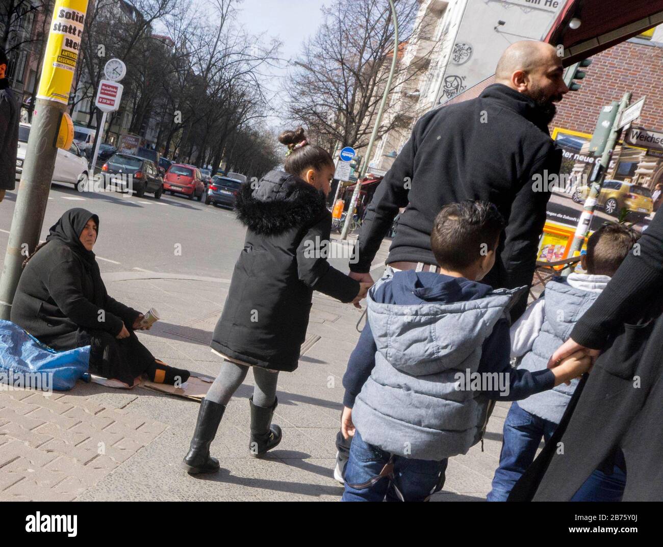 Beggar on the Sonnenallee in Berlin Neukoelln, on 04.03.2017. The Sonnenallee, now also called 'Arab Street' by residents, is also popular with many refugees who have come to Berlin. [automated translation] Stock Photo