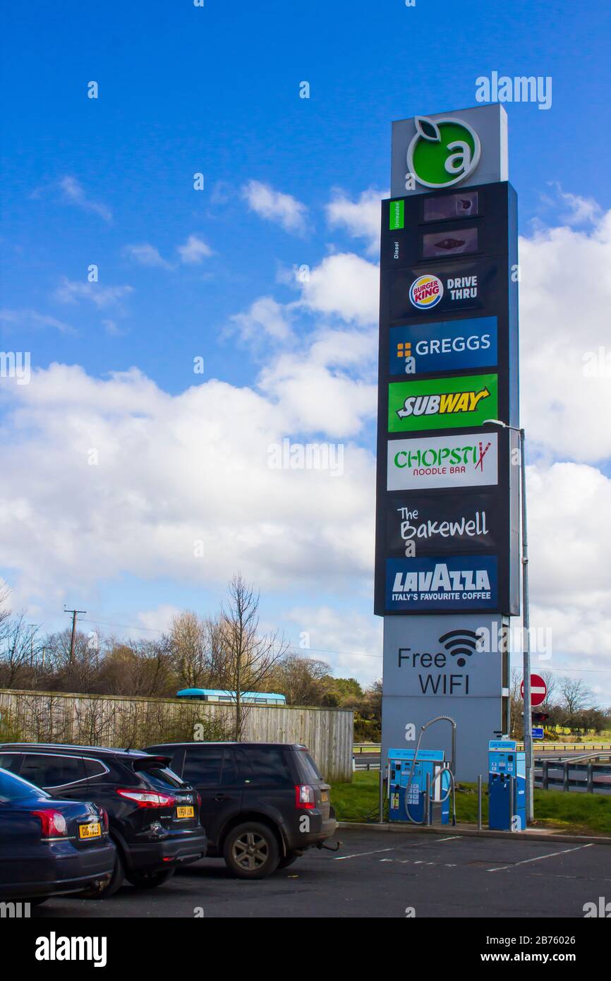 13 March 2020 The tall motorway sign at the entrance to the Applegreen services centre on the M2 Motorway in Newtownabbey Belfast Northern Ireland. Th Stock Photo