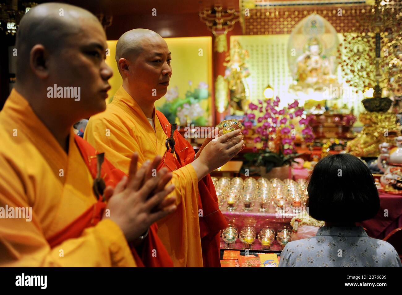 SINGAPORE, February 19, 2015 Buddhist monks join believers in prayers ...