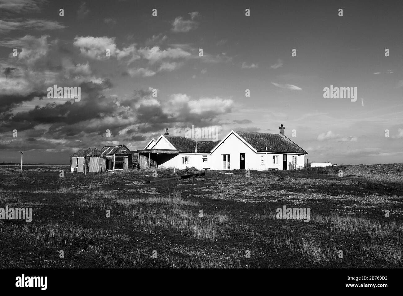 Shingle Street - March 2020: Isolated cottages on a remote part of Suffolk’s coast line. Stock Photo