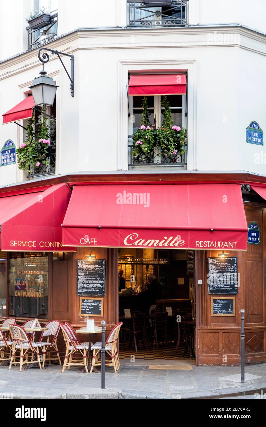 Front door to Camille - restaurant and cafe in the Marais, Paris, France Stock Photo