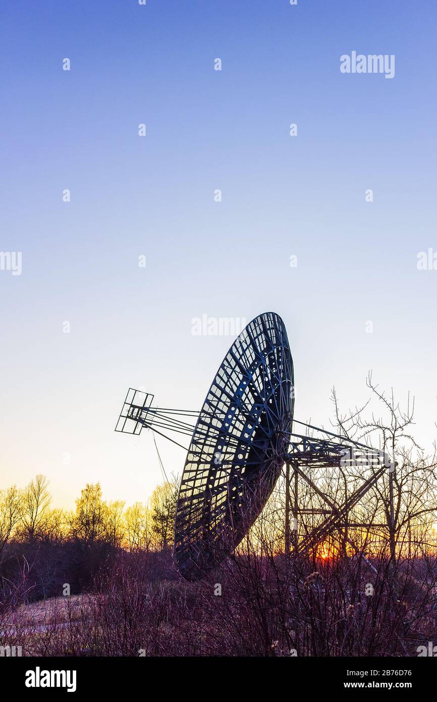 radio telescope dish satellite equipment at sunset landscape Stock Photo