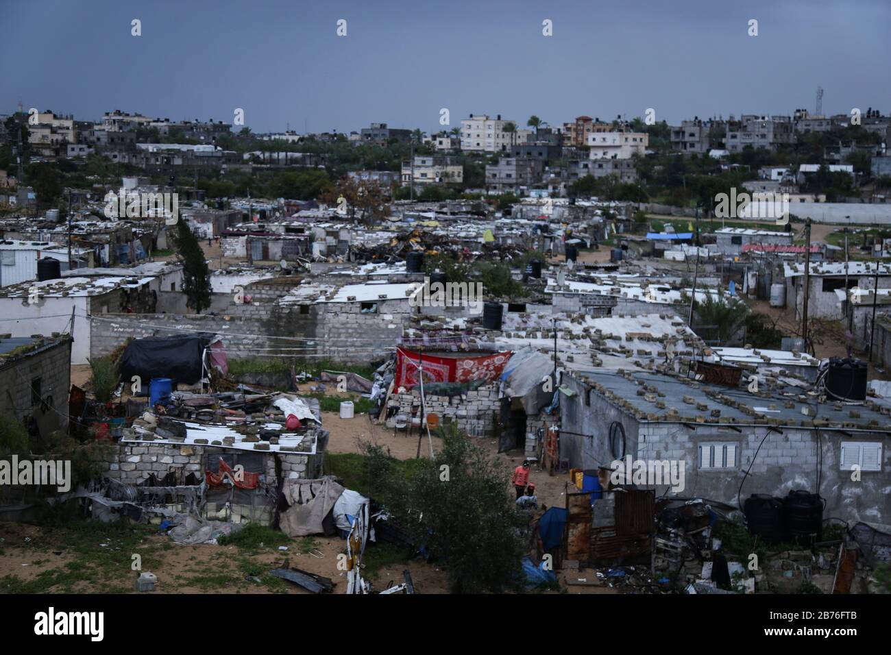 Gaza, Palestine. 13th Mar, 2020. General view of the poor neighbourhood of Khan Yunis refugee camp during a cold weather wave. Credit: Yousef Masoud/SOPA Images/ZUMA Wire/Alamy Live News Stock Photo