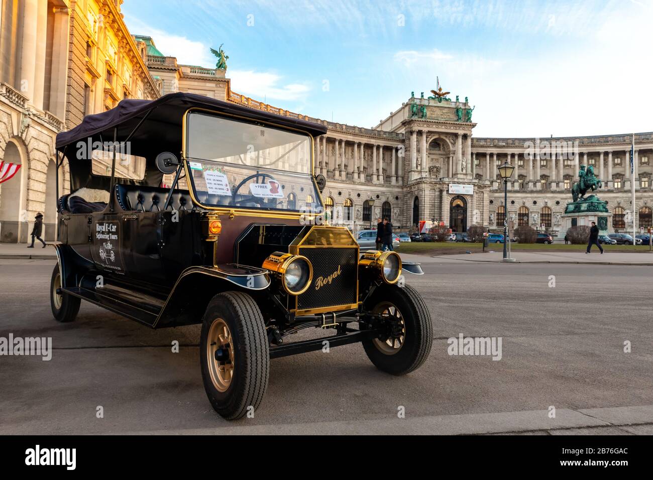 Vienna Austria January 12th 2020 Sightseeing Electric Car Styled Vintage Retro Vehicle For Tourist City Tour Against Vienna Hofburg Palace With Stock Photo Alamy