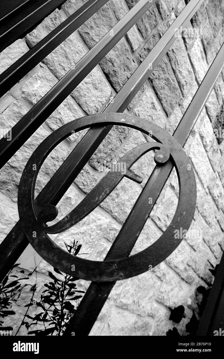 Iron gate emblazoned with the letter "F Stock Photo Alamy