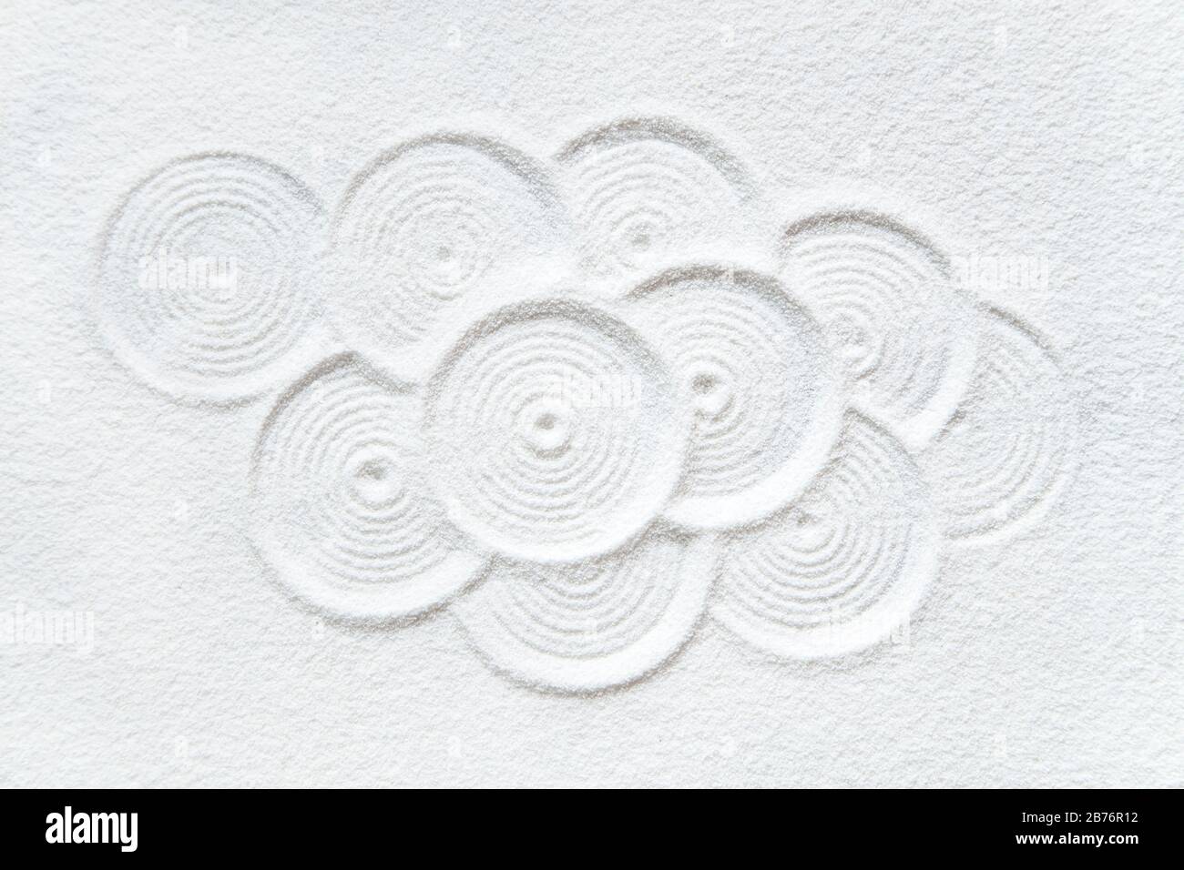 Zen pattern in white sand Stock Photo