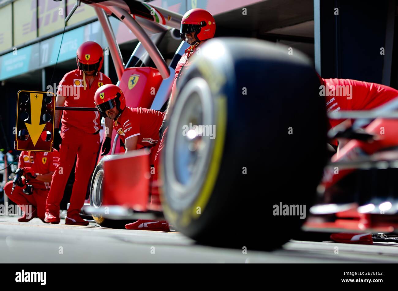 Team Ferrari rehearse a pit lane tyre change ahead of the Australian ...