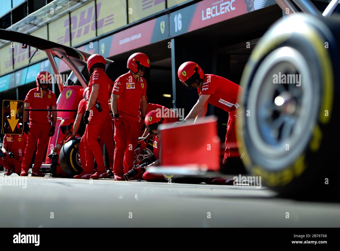 Team Ferrari rehearse a pit lane tyre change ahead of the Australian Formula One Grand Prix Stock Photo