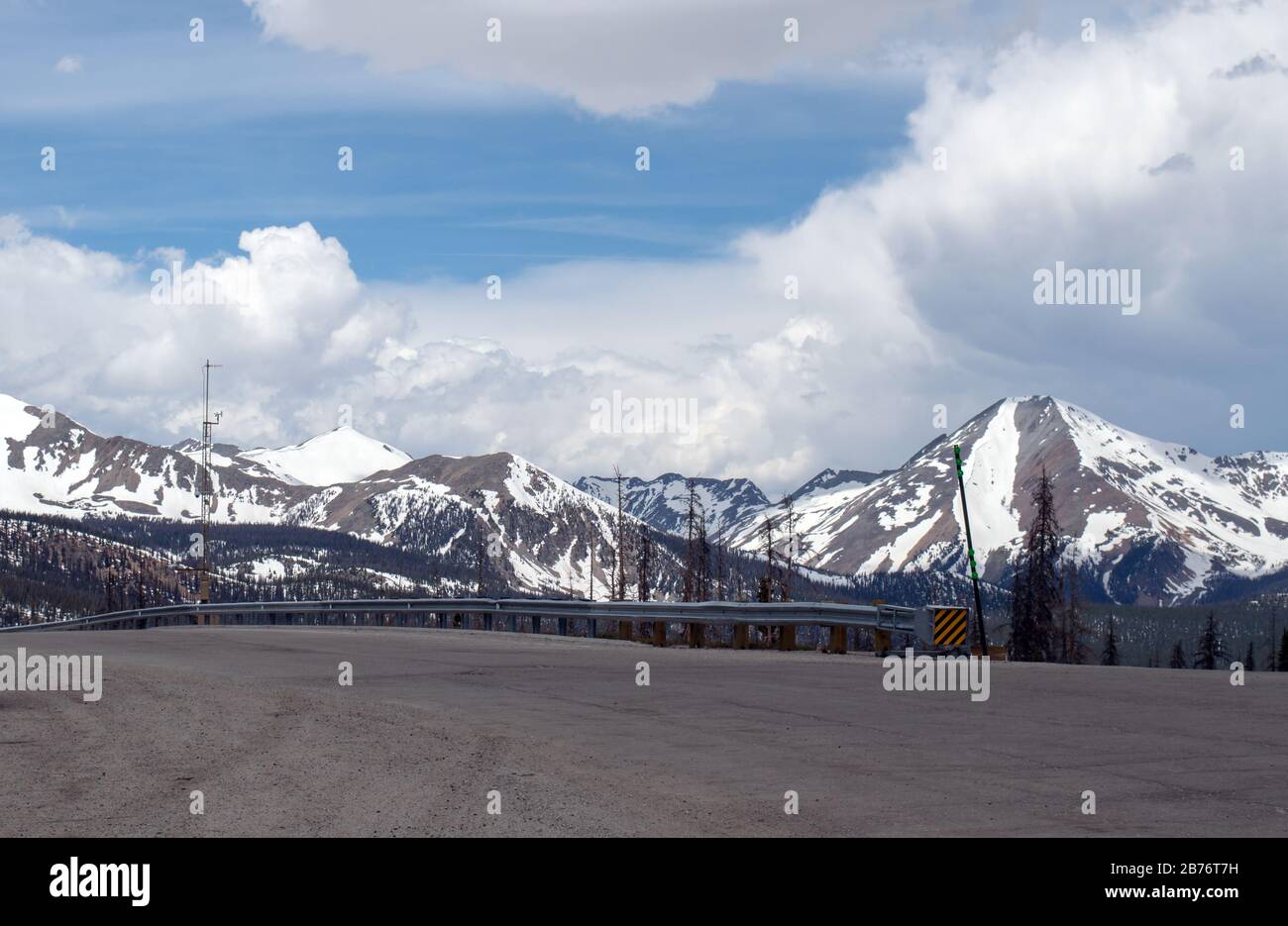 a beautiful scene at the snow covered Colorado Divide on a summer day. Plenty of available copy space in this lovely setting. Stock Photo
