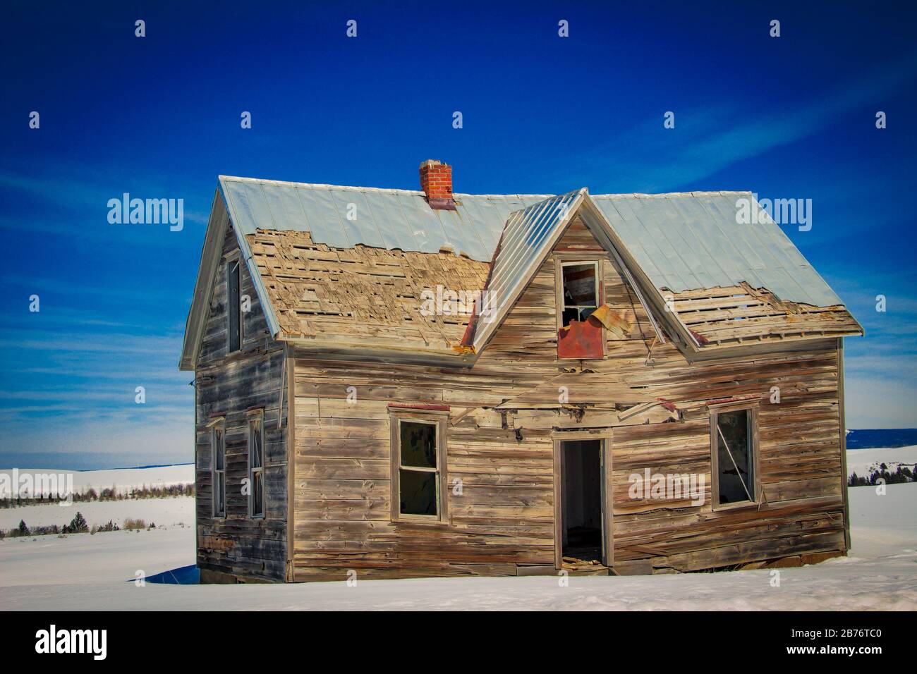 Abandoned Farm house in winter landscape Stock Photo - Alamy