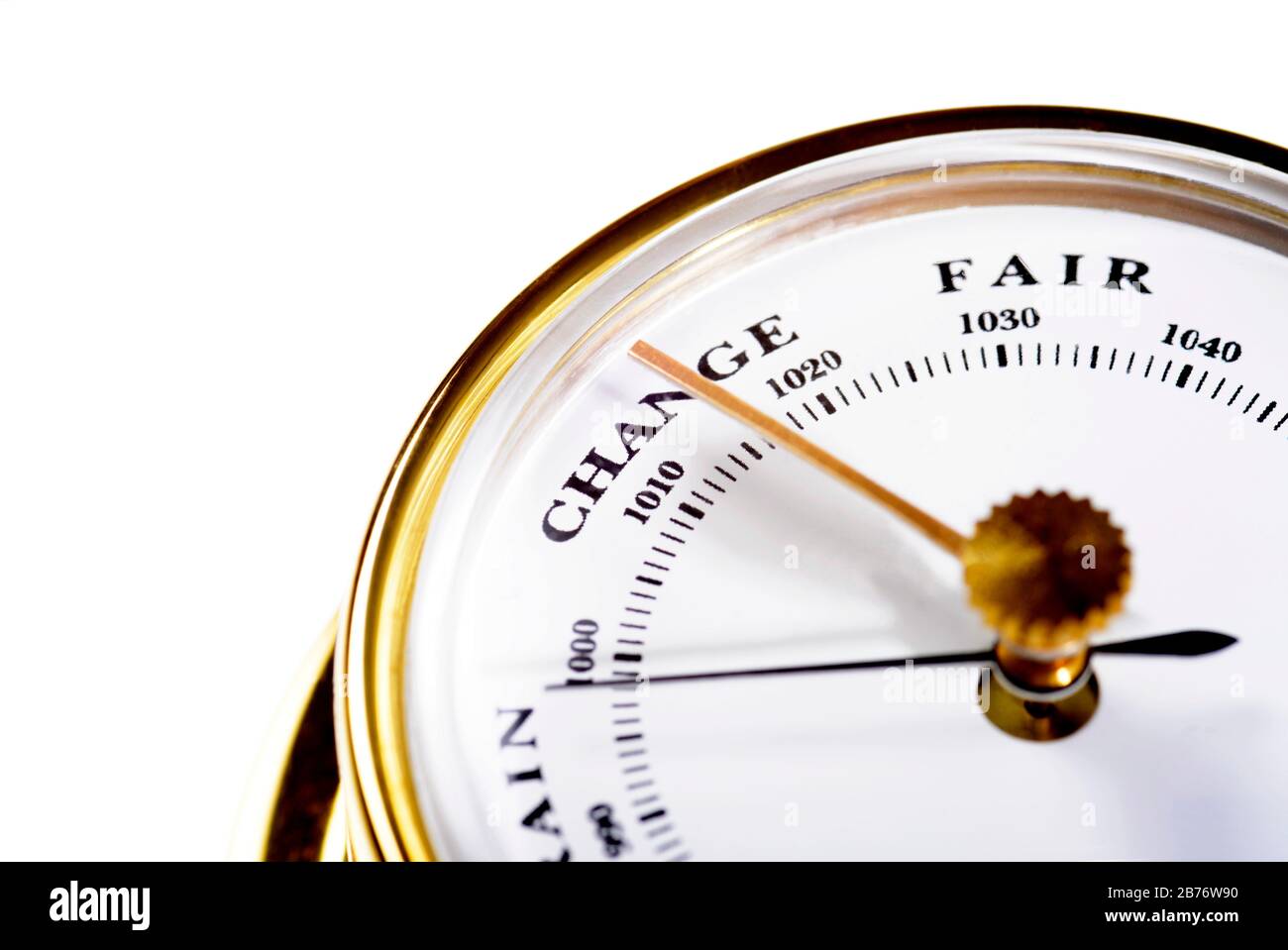 Barometer. A barometer is a device used to measure atmospheric pressure and its trend. The gold needle is positioned manually. The black needle moves of its own accord, and its position relative to the fixed gold needle indicates whether the atmospheric pressure has increased or decreased. This instrument is reading a low pressure. Stock Photo