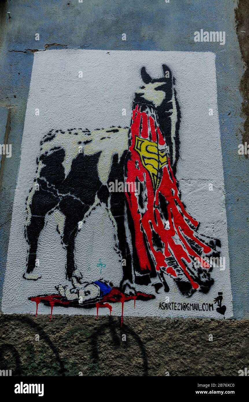 Graffiti of a llama eating S cape with him death Stock Photo