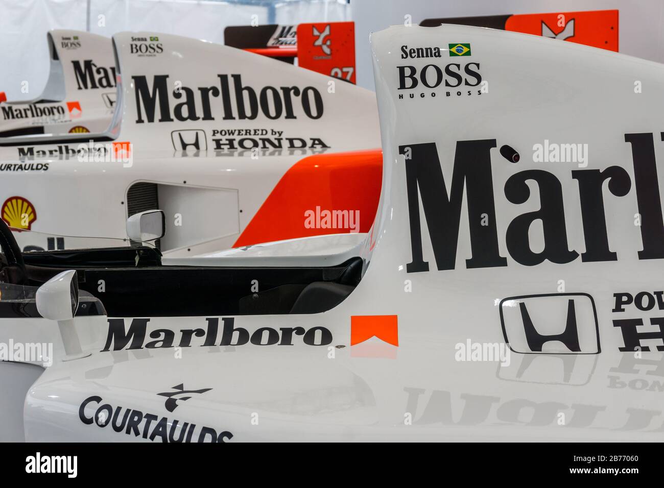 Close up detail of a McLaren Honda MP4/7 in the Honda Collection Hall in Suzuka, Japan, with an MP4-5 in the background. Stock Photo