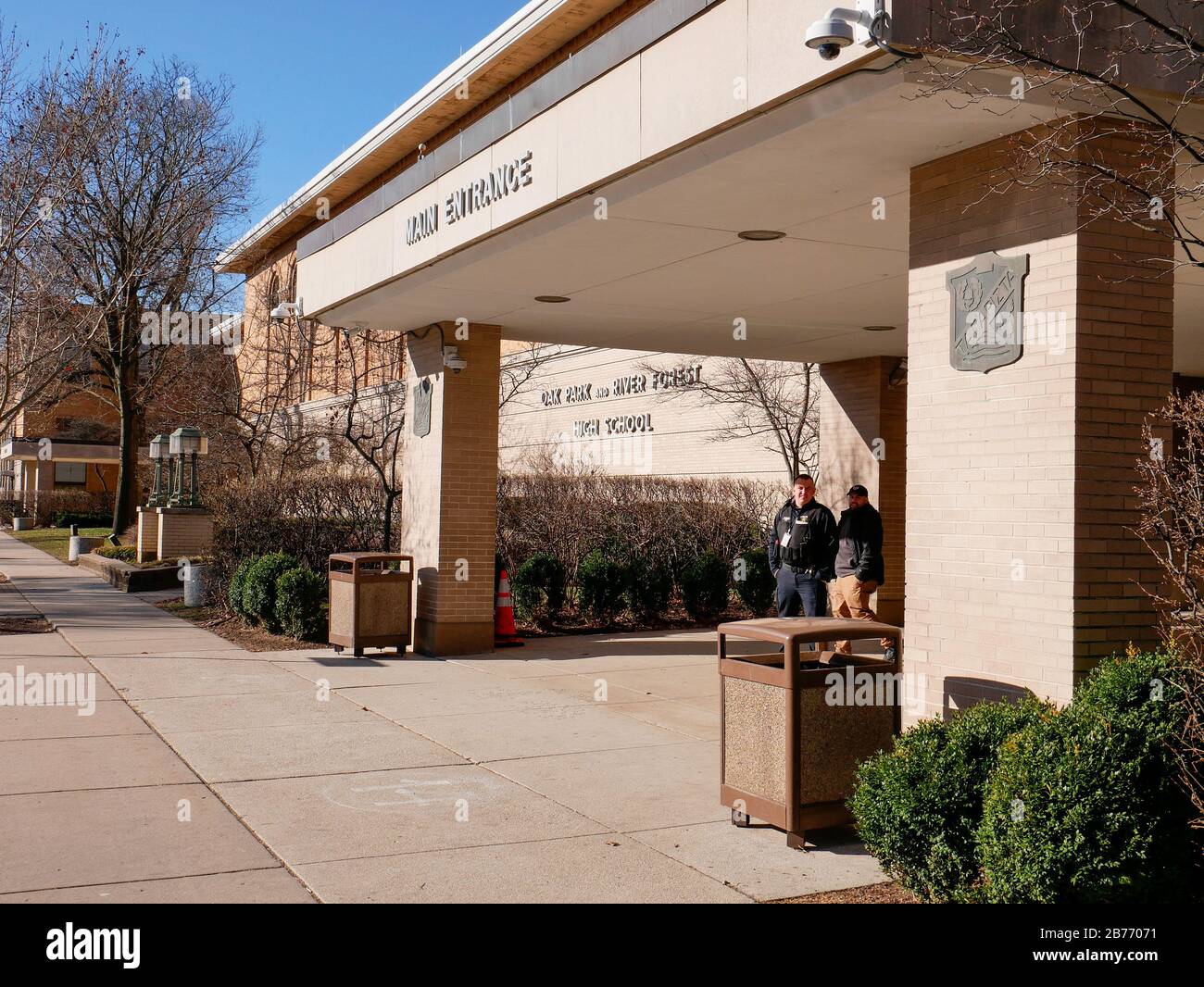 Oak Park, Illinois, USA. 13th March 2020. A police officer stands watch