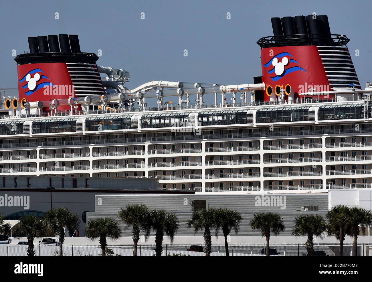 Port Canaveral, United States. 13th Mar, 2020. The Disney Dream cruise ship prepares to depart from Port Canaveral in Florida the day before the cruise line suspends its operations for all new departures effective March 14 in response to the coronavirus (COVID-19) outbreak. Credit: SOPA Images Limited/Alamy Live News Stock Photo