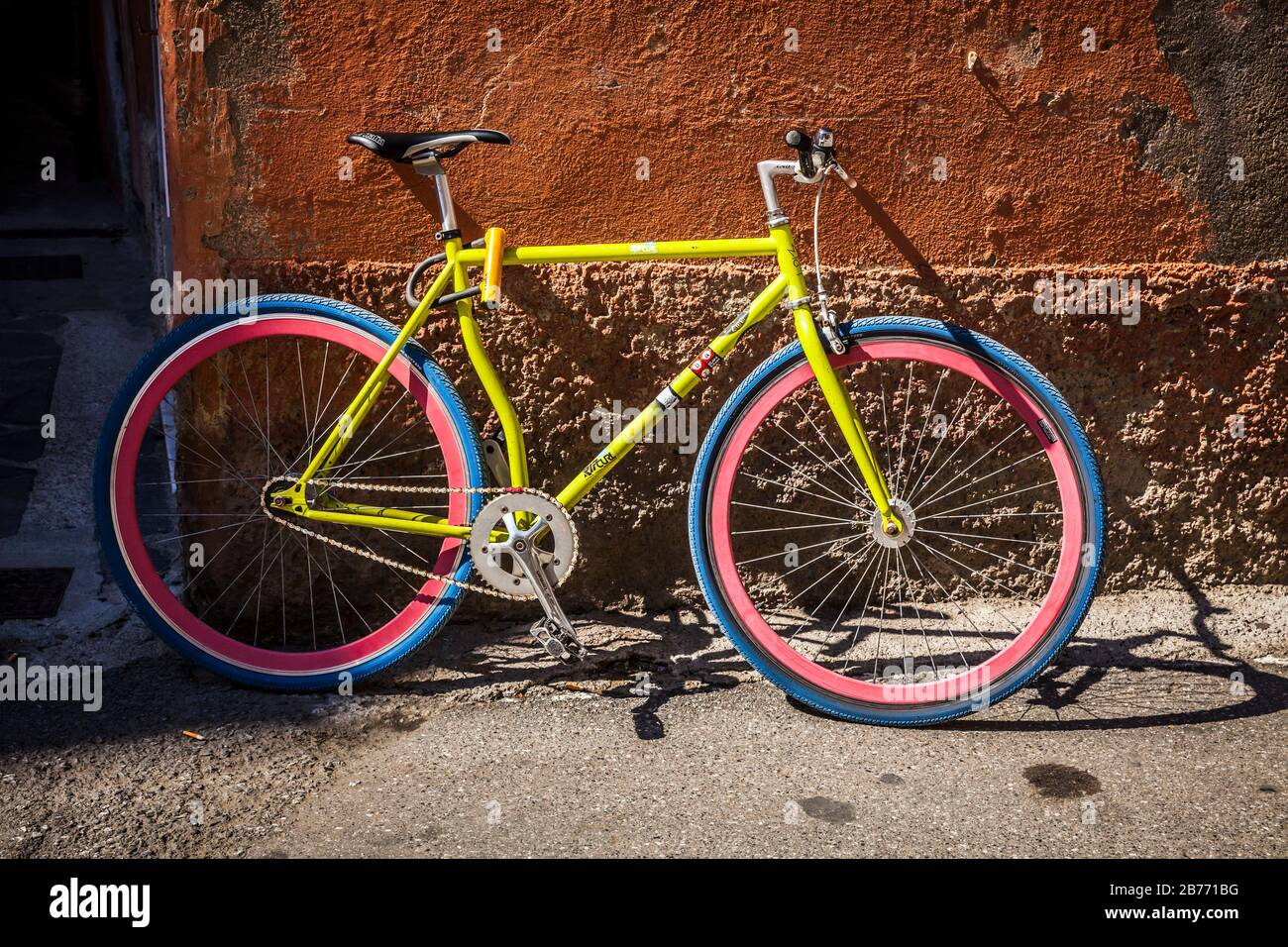 A bicycle and textured wall, Monterosso al Mare, Italy. Stock Photo