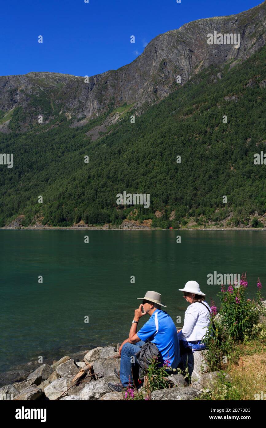 Couple on Sculpture Beach, Skjolden Village, Sognefjord, Sogn og Fjordane County, Norway Stock Photo