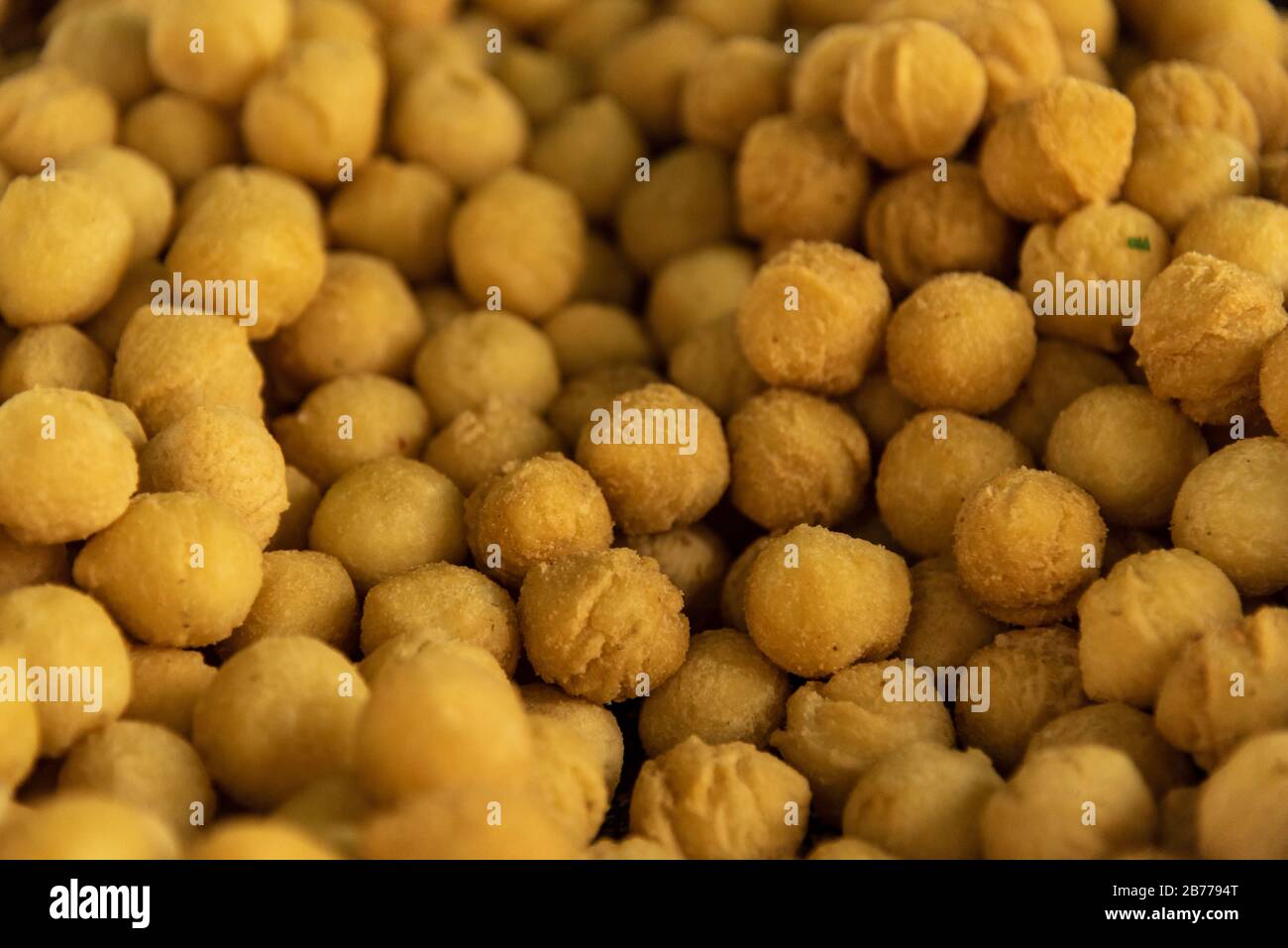 Raw pile of noisette potatoes with shallow depth of field Stock Photo
