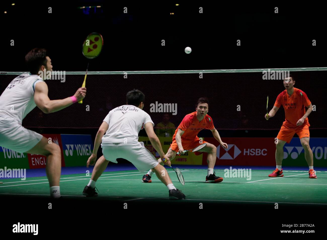 London, UK. 13th Mar, 2020. China's Huang Kaixiang (2nd R) and Liu Cheng (1st R) compete during the men's doubles quarterfinal match with Chinese Taipei's Wang Chi-Lin and Lee Yang at All England Badminton 2020 in Birmingham, Britain on March 13, 2020. Credit: Tim Ireland/Xinhua/Alamy Live News Stock Photo