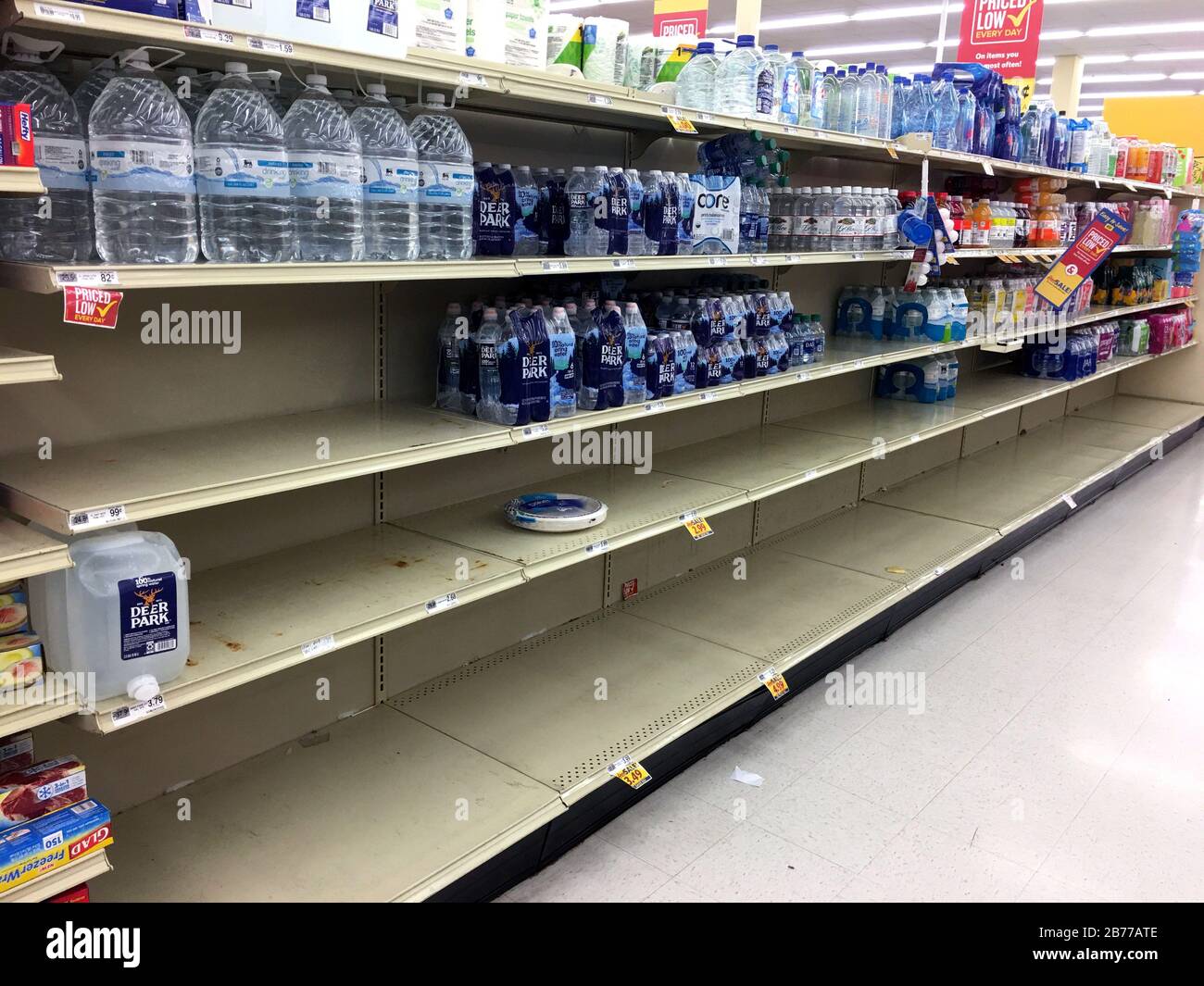 Nashville, United States. 13th Mar, 2020. Food Lion in Priest Point shopping center on Bell Road experiences bottled water shortages and empty shelves as shoppers react to the tornado devastation and the coronavirus by stocking up on essential supplies Friday, March 13, 2020, in Nashville, Tenn. (Jim Brown/Image of Sport via AP) Photo via Credit: Newscom/Alamy Live News Stock Photo