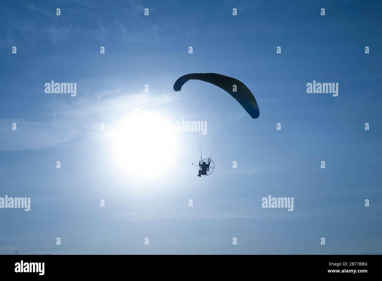 A hot air balloon festival features paragliders, hot air balloons and other forms of air transports. Stock Photo