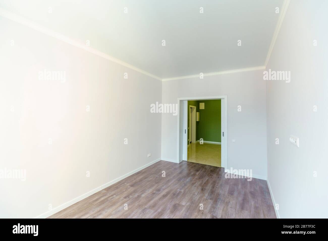 An Empty Room With White Walls And Wooden Floors Fresh New