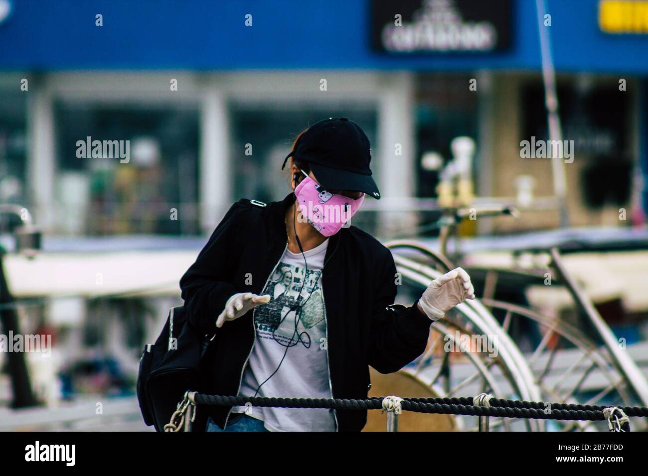 Download Limassol Cyprus March 13 2020 View Of A Unidentified Tourist With A Facial Mask To Protect Himself From The Corona Virus Walking In The Streets Of Li Stock Photo Alamy PSD Mockup Templates