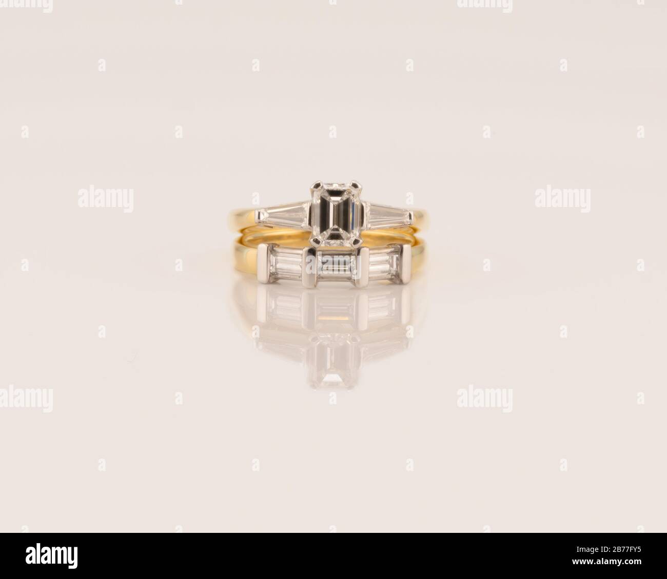 A tiffany style emerald cut diamond solitaire engagement ring with