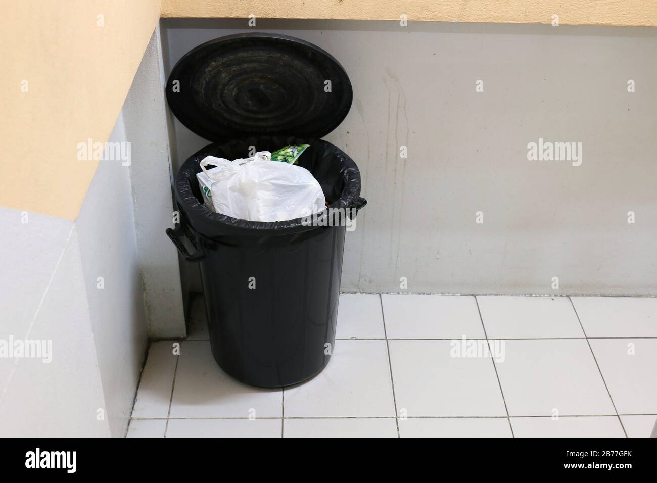 Bin Garbage or Trash on sidewalks staircase side in apartment Stock