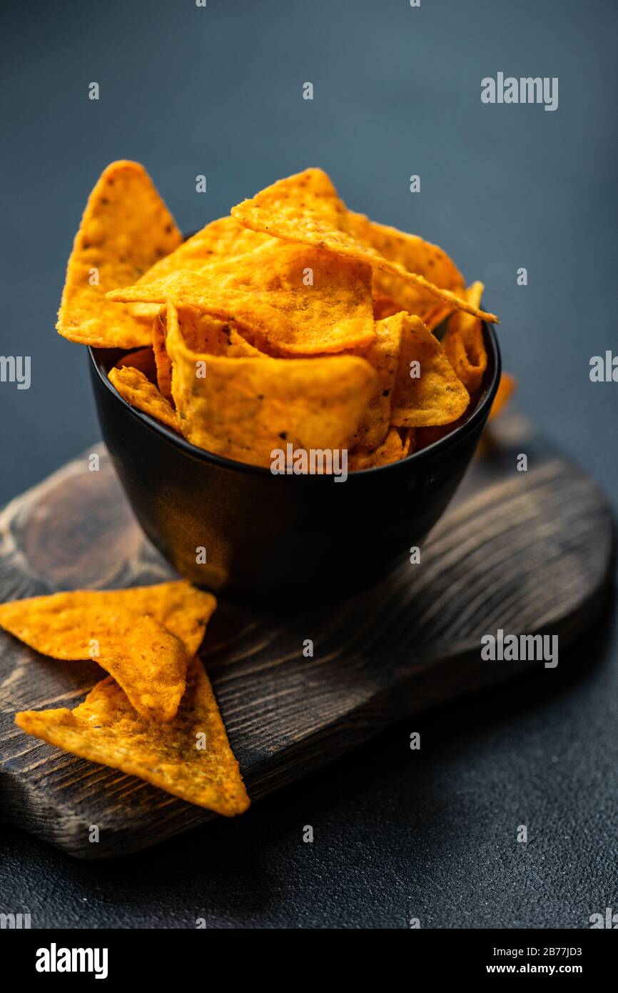 Healthy vegetable chips on dark background with copy space Stock Photo