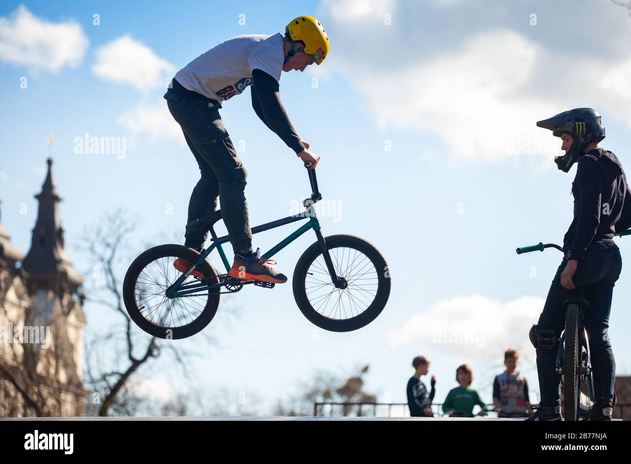 Lviv, Ukraine - March 12, 2020: Young man doing tricks on a BMX bike.  Teenagers bikes at an urban biking and Skate park Stock Photo - Alamy