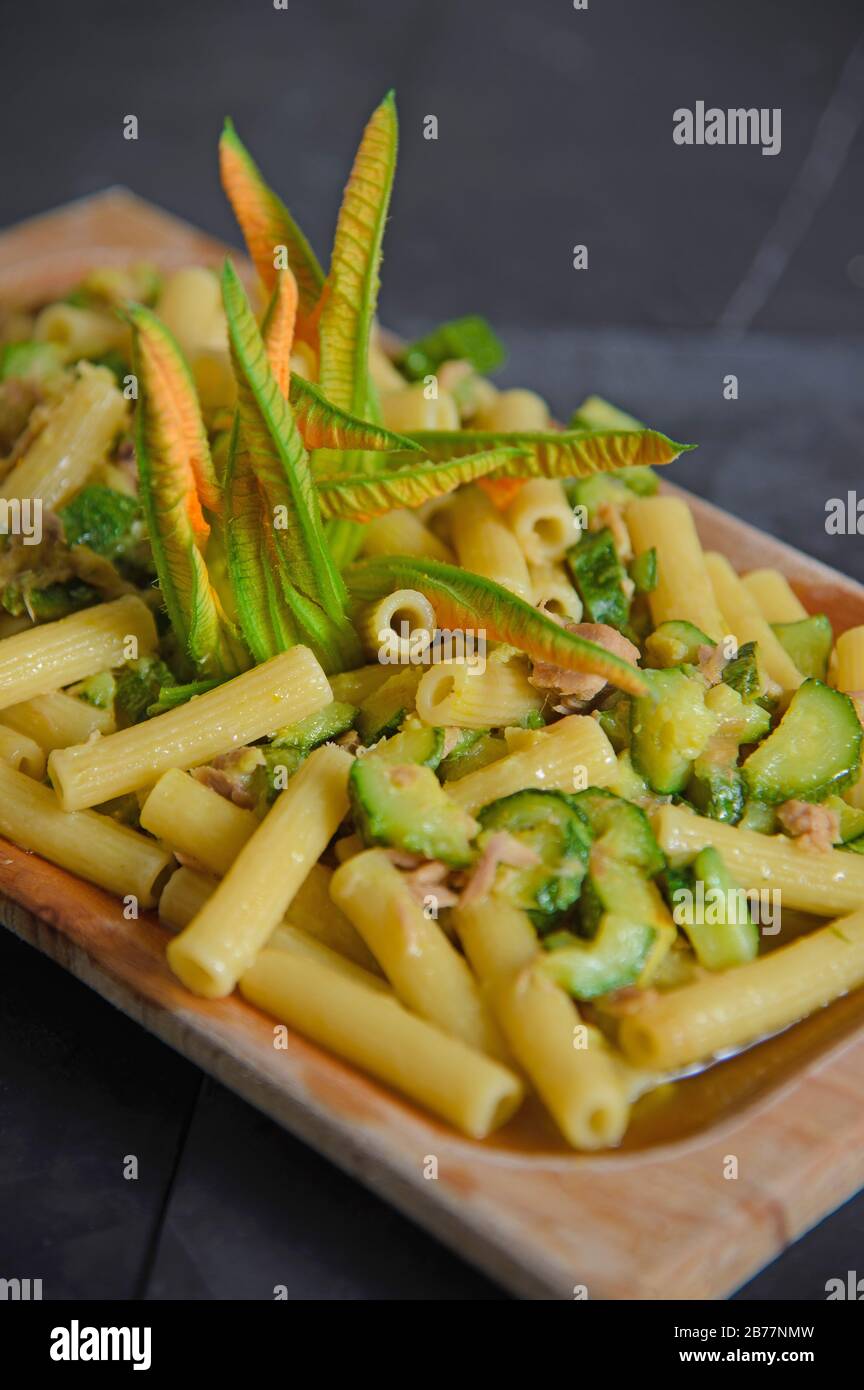 Italian pasta with courgette flowers, courgettes, saffron and tuna fish