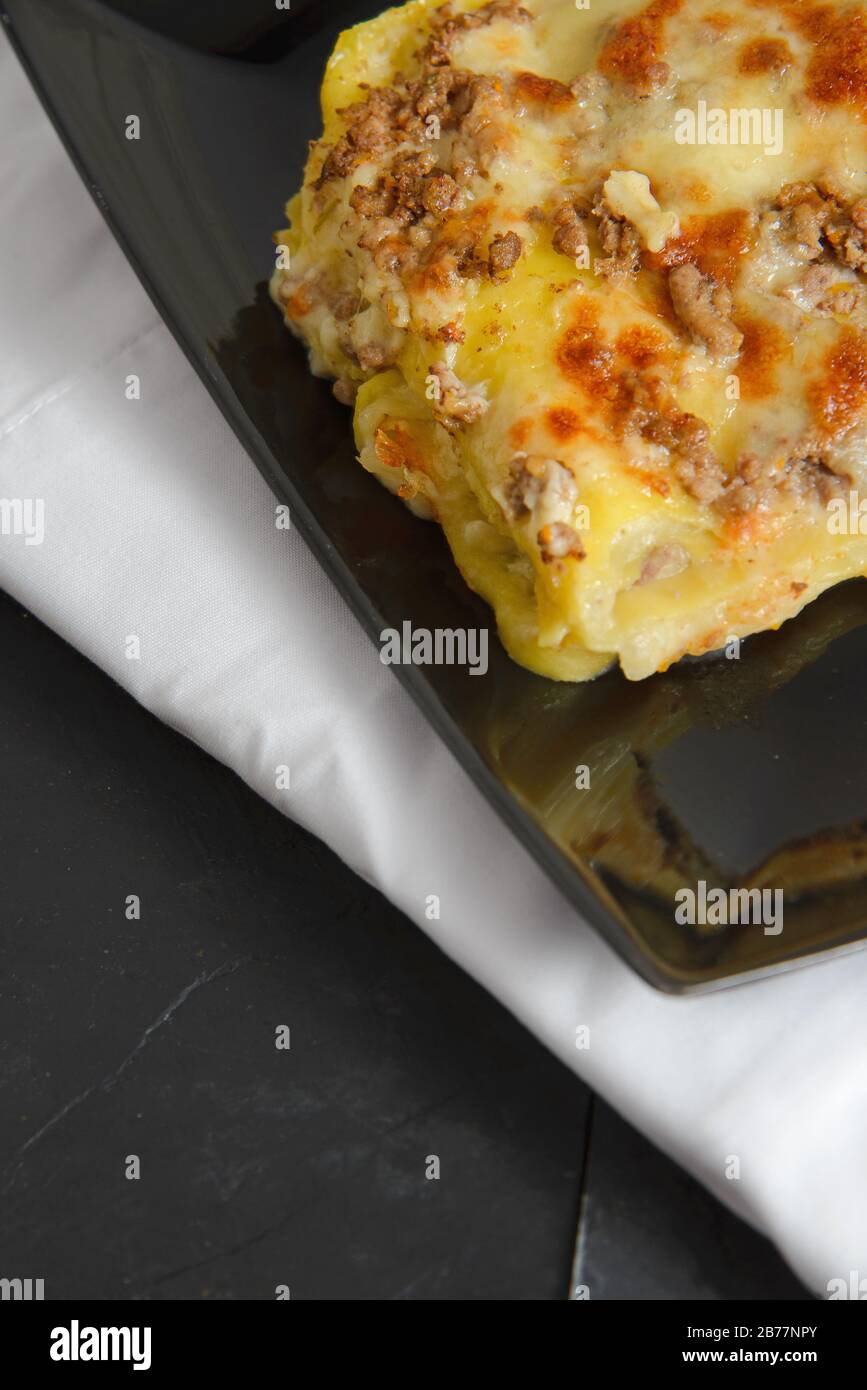 Italian typical white lasagna Italian pasta Vertical studio shot