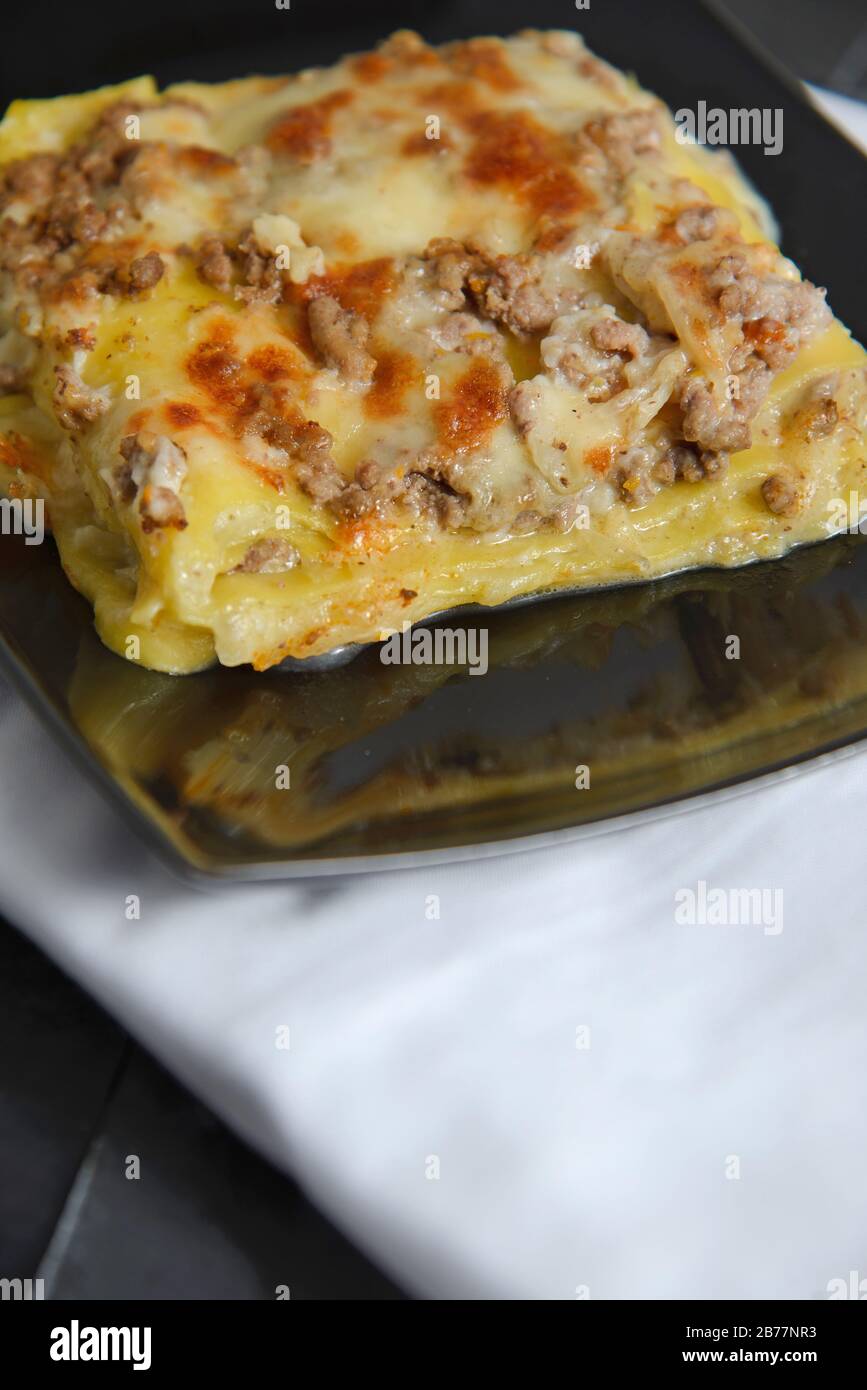 Italian typical white lasagna Italian pasta Vertical studio shot