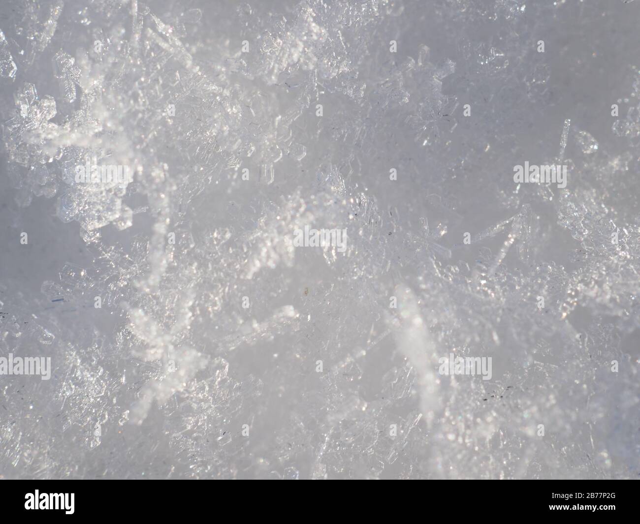 White snow and clear ice. Background Stock Photo - Alamy