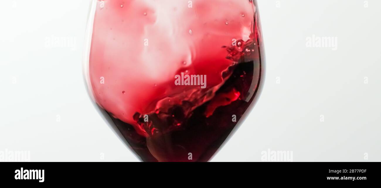 Glass of red wine at tasting event, quality control and alcoholic