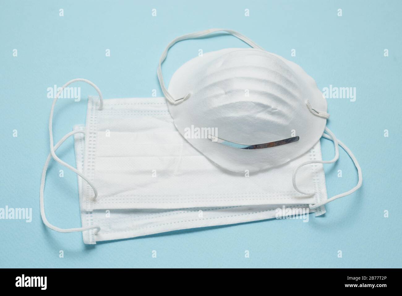 Disposable surgical face mask cover the mouth and nose. Healthcare and medical concept. Protect from Covid-19, Coronavirus, 2019-ncov, corona-virus. C Stock Photo