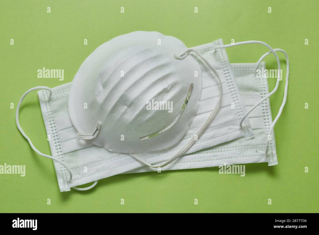 Disposable surgical face mask cover the mouth and nose. Healthcare and medical concept. Protect from Covid-19, Coronavirus, 2019-ncov, corona-virus. C Stock Photo