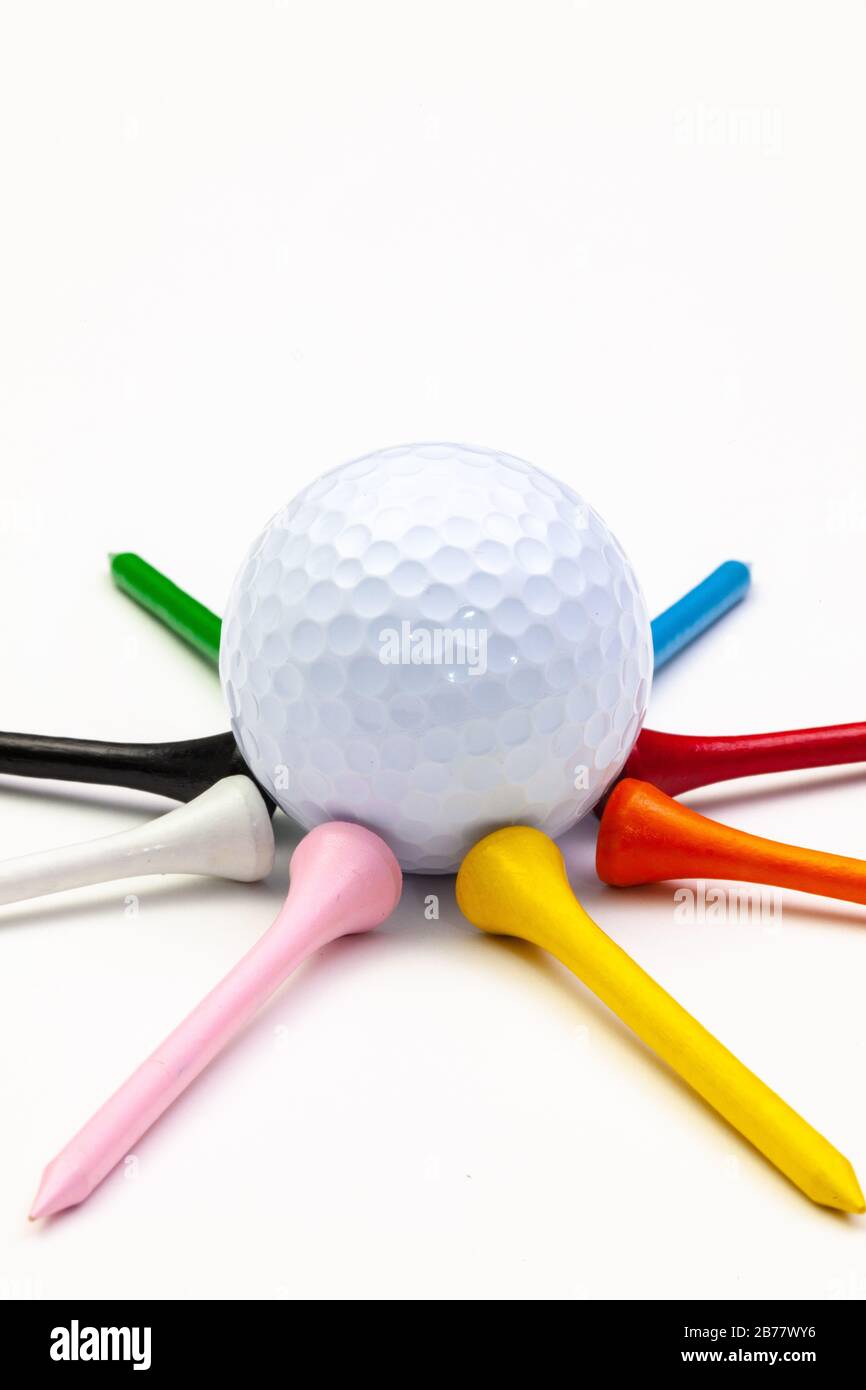 Golf set ball with tees. Golf tees in the rainbow colors. Star
