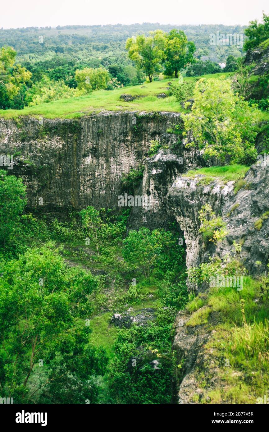 Stone Mine Chalk-cliff hill (Bukit Kapur Jaddih) in Madura, Java Indonesia Stock Photo