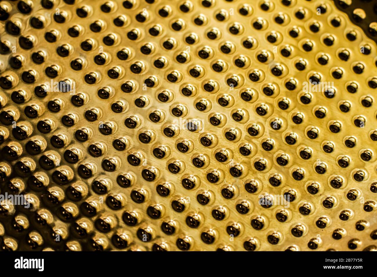 Texture of golden metallic surface as background, materials and ...