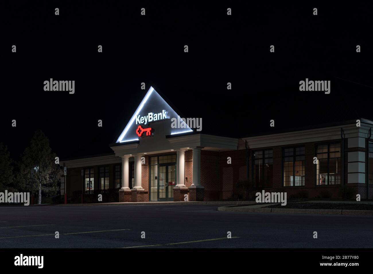 Fayetteville, New York - Mar 09, 2020: Low Key Night View of Key Bank Building Exterior. Stock Photo