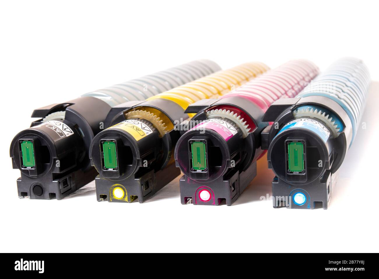 cartridges for laser printers aligned on a white background. Stock Photo