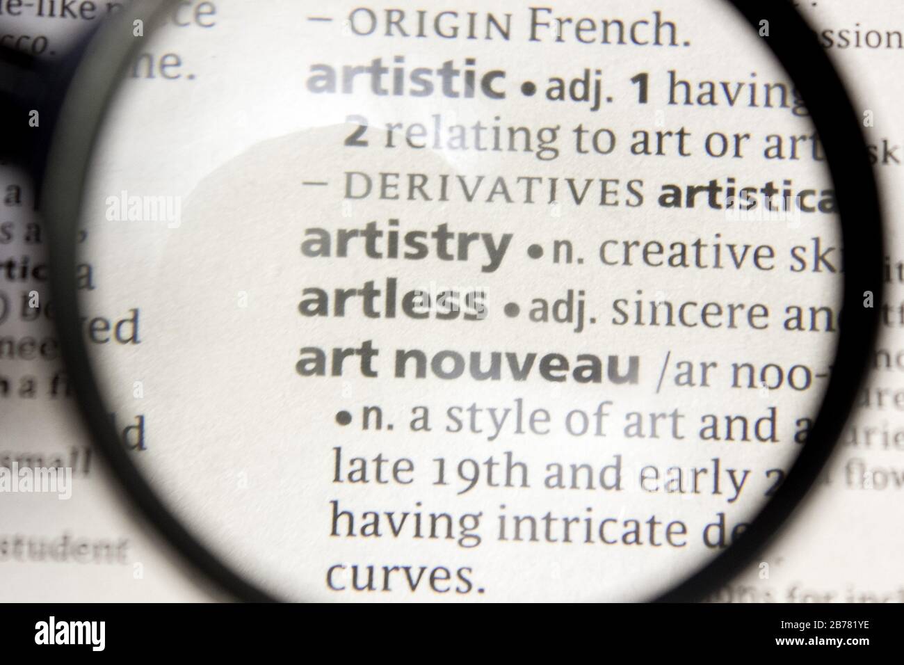 Artistry, artless and art nouveau word or phrase in a dictionary Stock